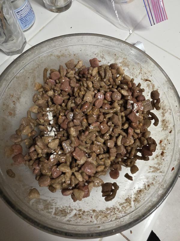 Sprinkled over dog food