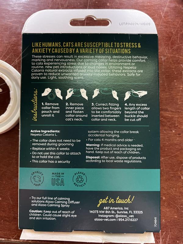 Back of a box showing instructions and active ingredient of catnip for Alzoo brand Calming Collar for Cats shown as it comes in the box.