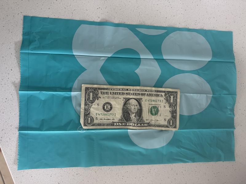 Size compared to dollar bill - large size