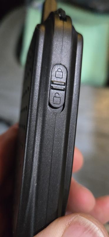 This shows the switch on the side that can lock out accidental button presses.