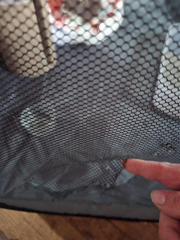Hole in playpen