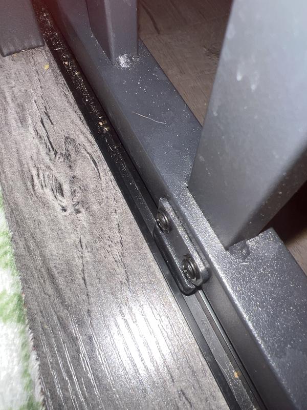 The piece that keeps each door in the rail is made of plastic