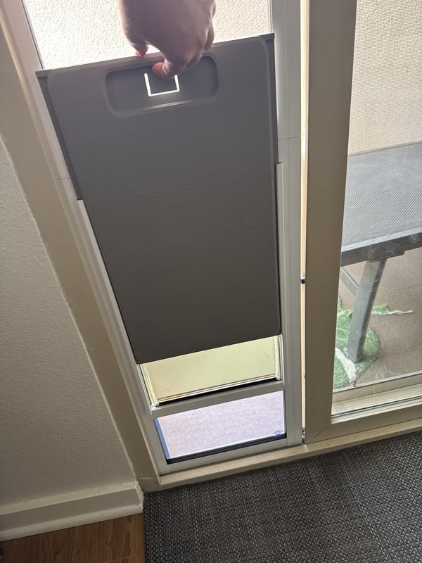 flap door cover included; I also taped a piece of paper at the bottom so my dogs could not see through the glass below the door flap