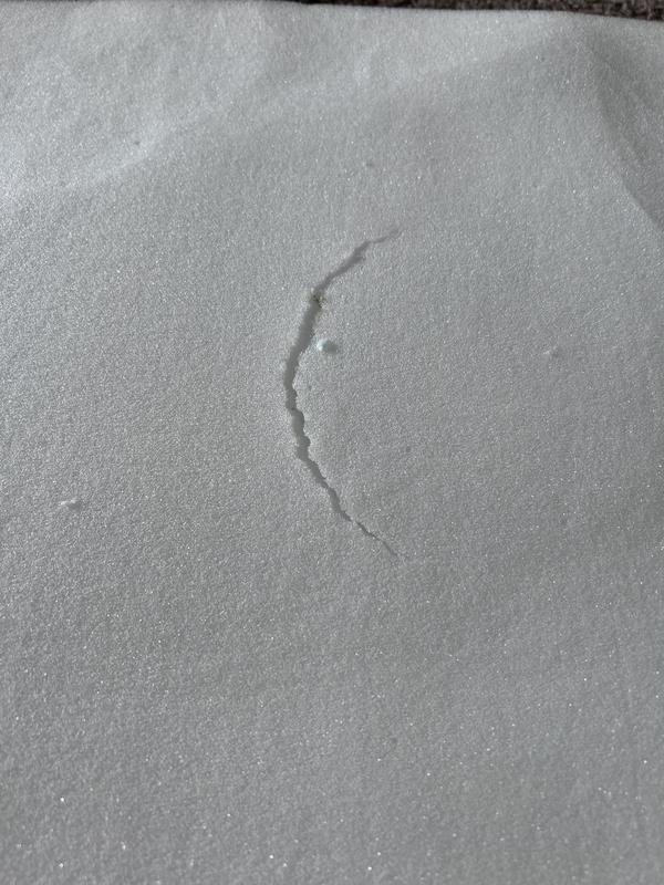 Bottom foam is ripped in 2 areas