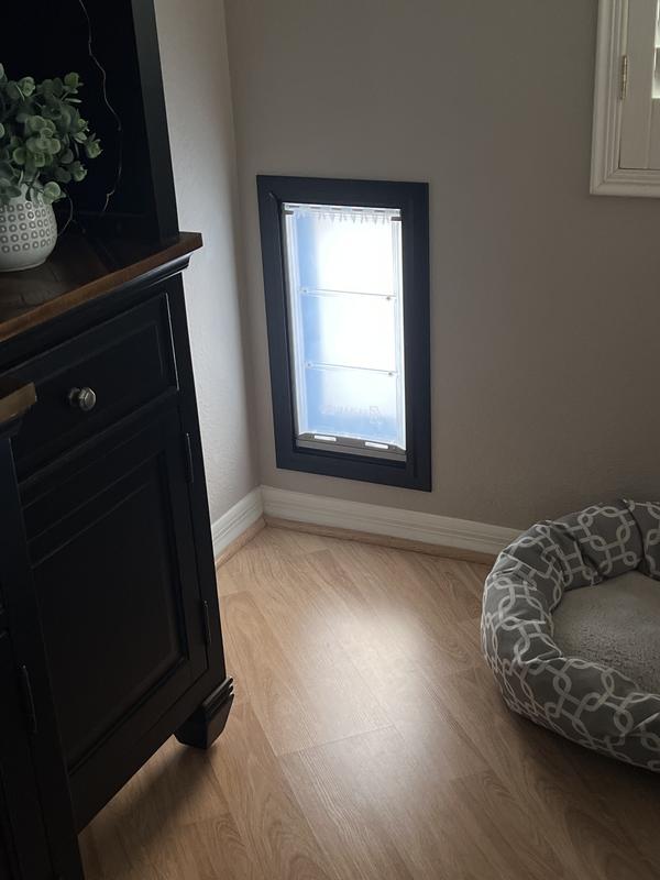 I upgraded to this in-wall pet door from a patio slider pet door insert!