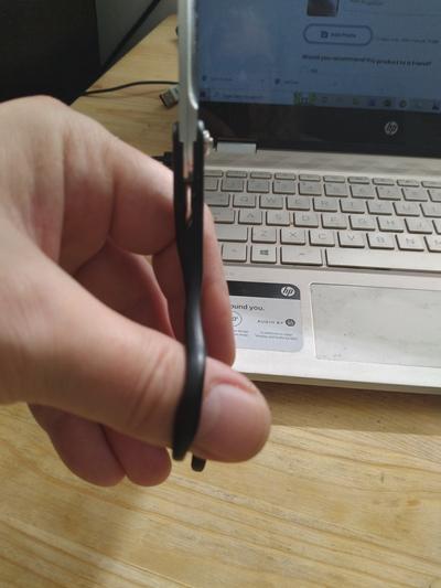 Left thumb inserted with the given contour, can't get a finger in the lower part of the handle