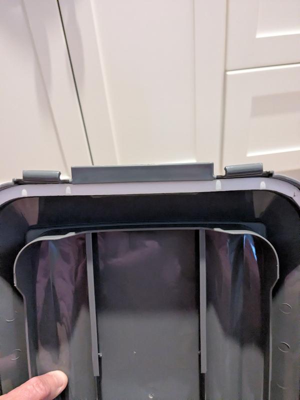 If you look at the tabs on the edges of the top you can see they're bent.