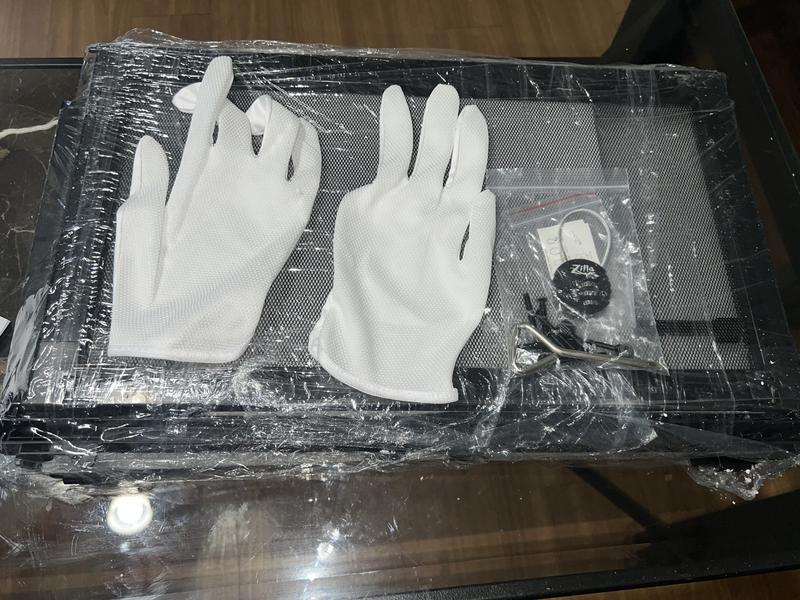 Gloves and lock that come with the hardware for the build.