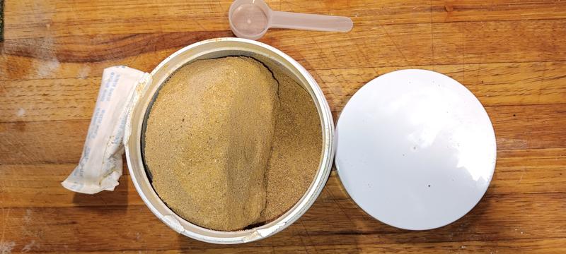 Instead of loose powder, it's in a clump that's hard as a rock