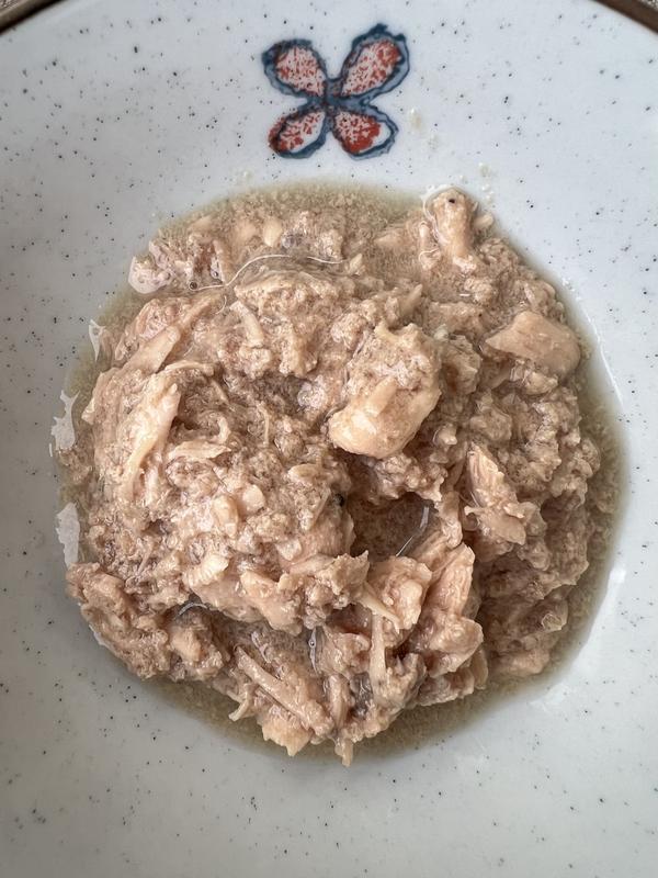 Close up of Tiki Cat After Dark: Shreds With Rabbit and Chicken Liver in Broth in a bowl.