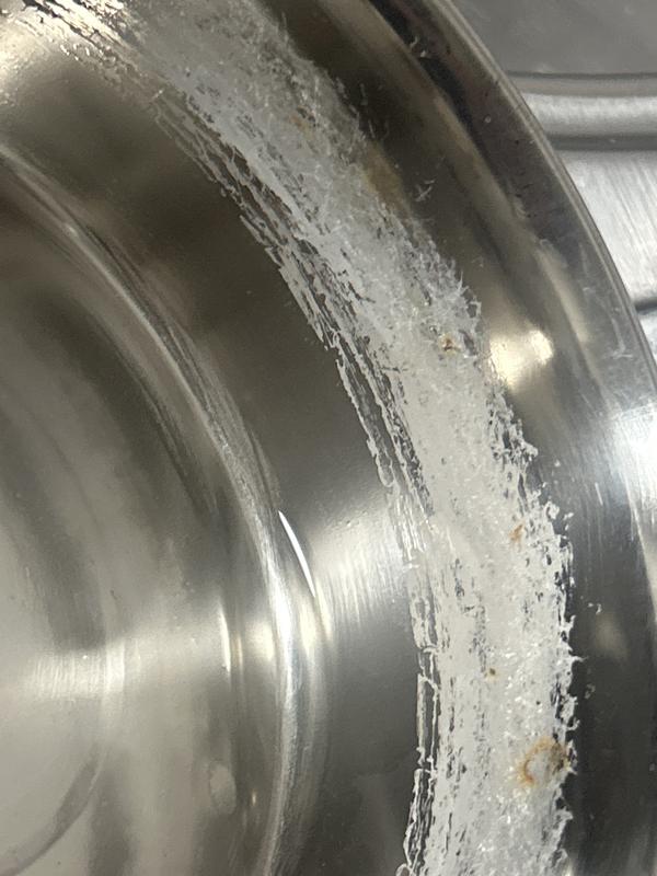 Rust spots visible on the bowl