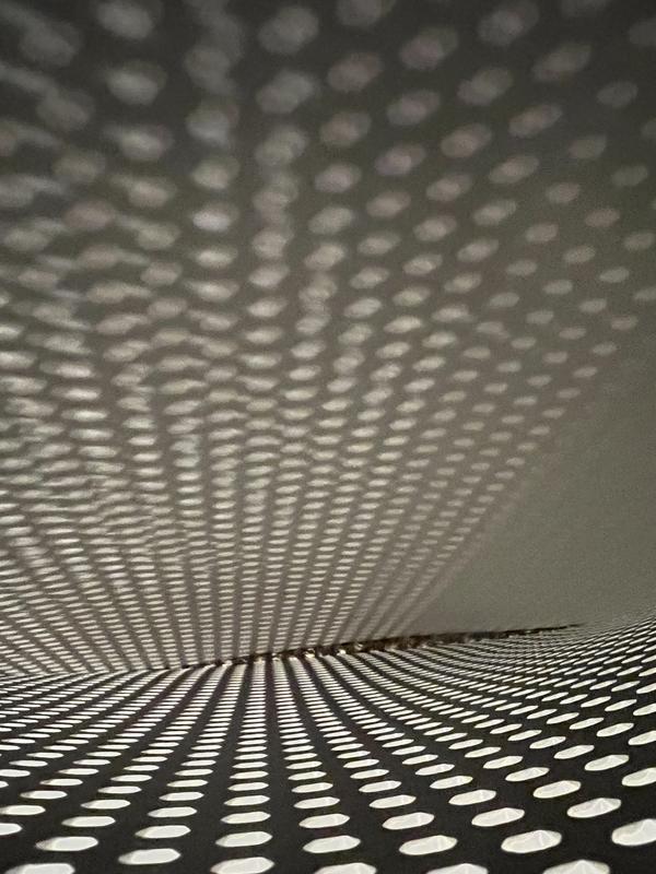 The mat opened. To see Inside of the mat with some kitty litter