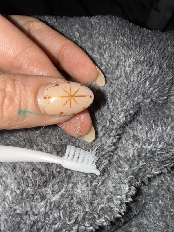 Picture of the bristles being easily pulled out