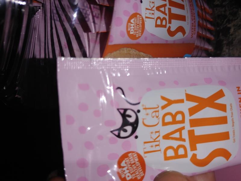 Tiki Cat Baby Stix in canister. They are chicken flavored in creamy chicken gravy.