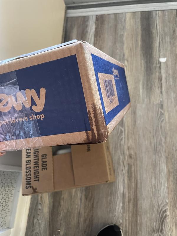 Wet and box squishy from liquid being spilled