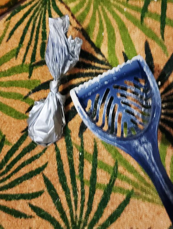 Just a lil cat poop and a big cat scooper!