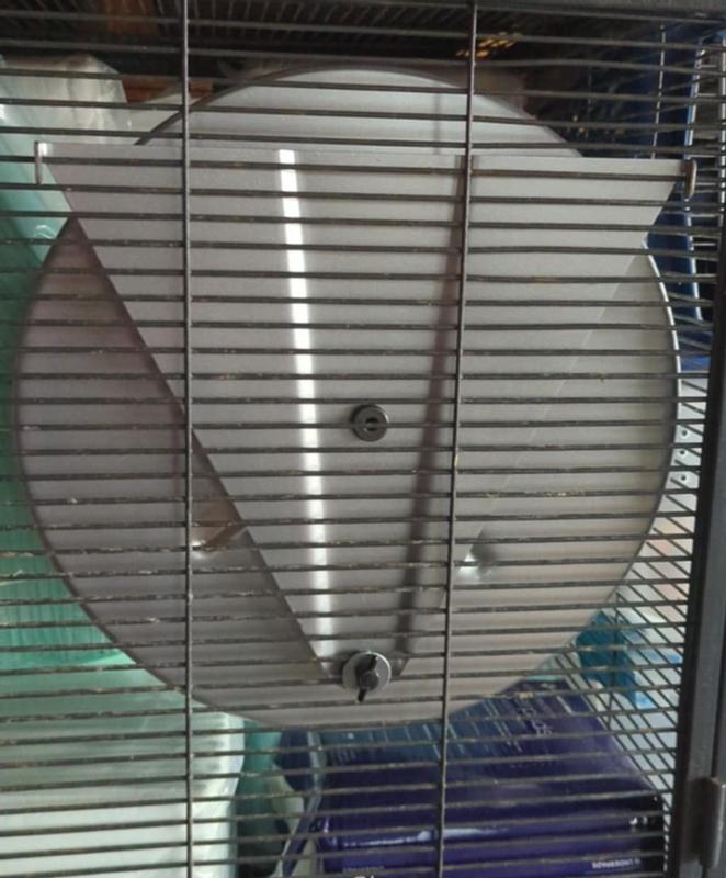 Simply bend up the wire of the critter nation, and the wheel secures perfectly.