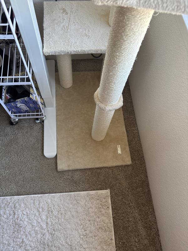 The base which is tight enough to fit in this small corner (this space is literally 16” and the base is 13.5”x21.5”)