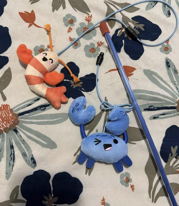 The cat wand with the shrimp and crab attachments