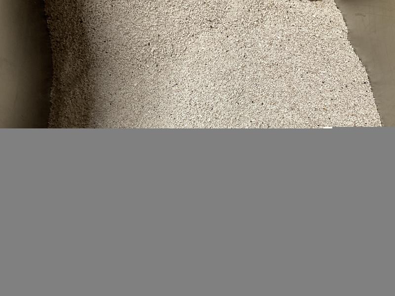 Black dots are the activated charcoal. Dark brown specks ARE NOT bugs.