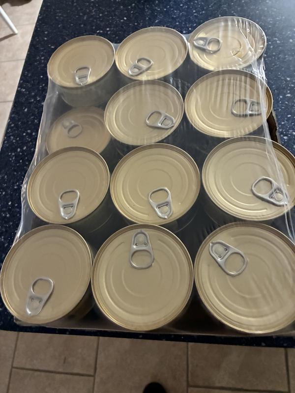 The shrink wrap is tight. No way the can could have slipped out. Maybe a Cat Burglar