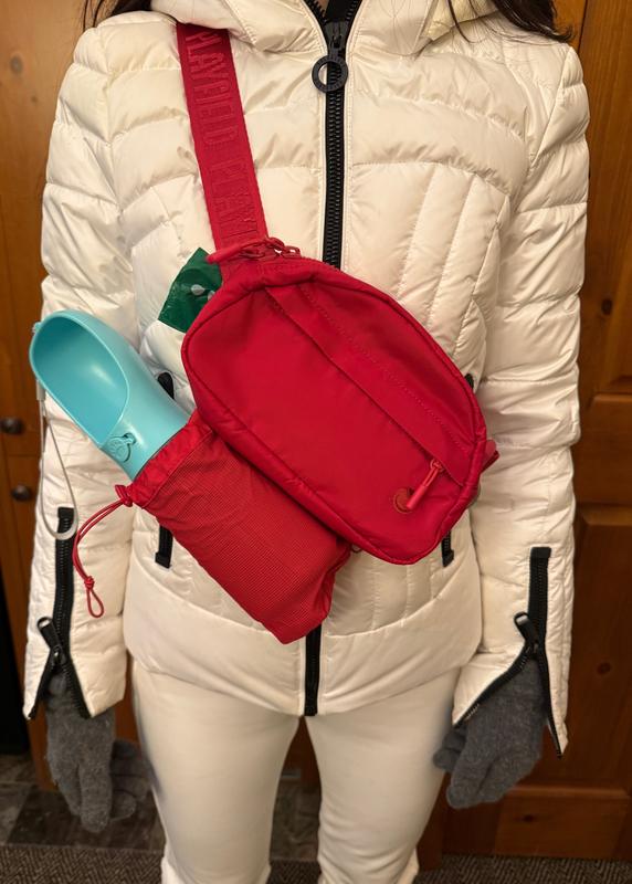 Holds our 500mL water bottle