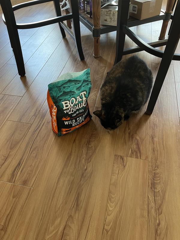 Emma eating Boat to Bowl Salmon