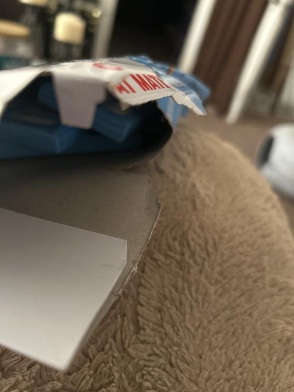 Top of box ripped open.  Usually filters are individually sealed in plastic and these were not.