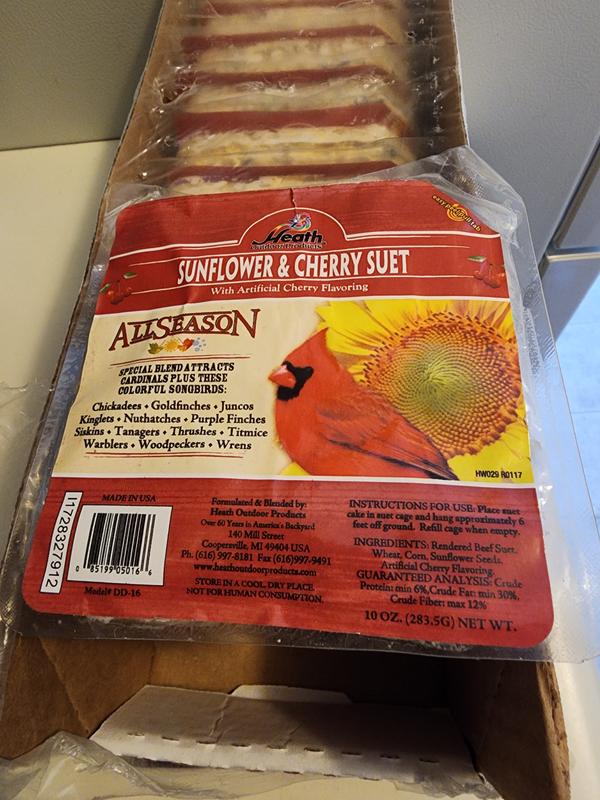 An individually packed suet block atop the multipack container.