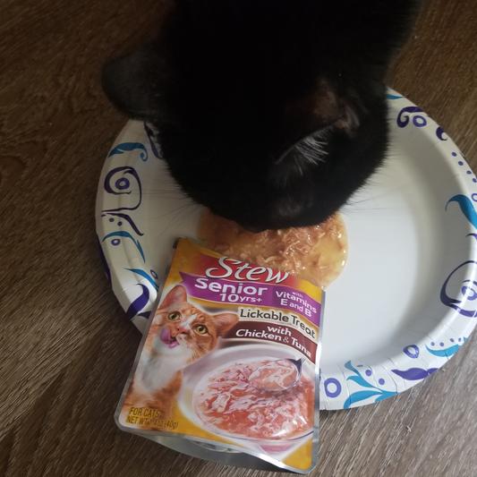 He started in on it before I could empty the pouch.