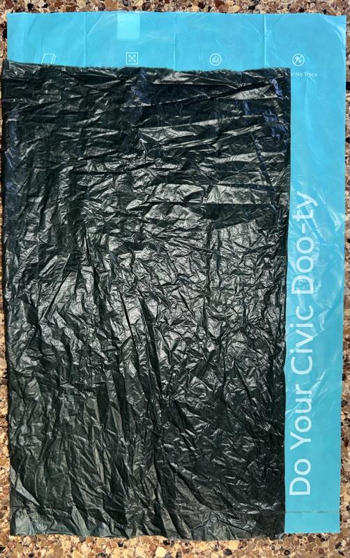 Standard bag laid on top of a Doo-Better bag for size reference