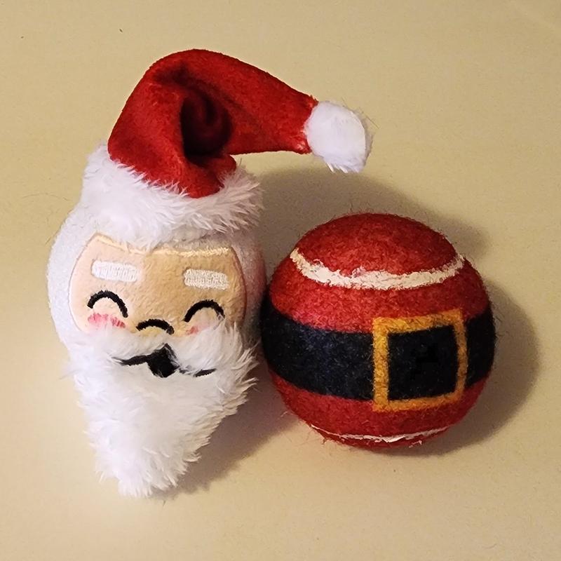 The two balls side by side. Santa's head is on the left; Santa's belly is on the right.