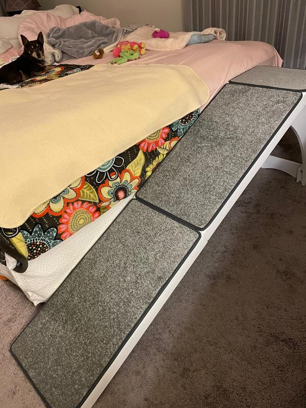 Ramp at end of my king-sized bed. It actually fits the entire end of bed without the edge sticking out, like the photo shows.