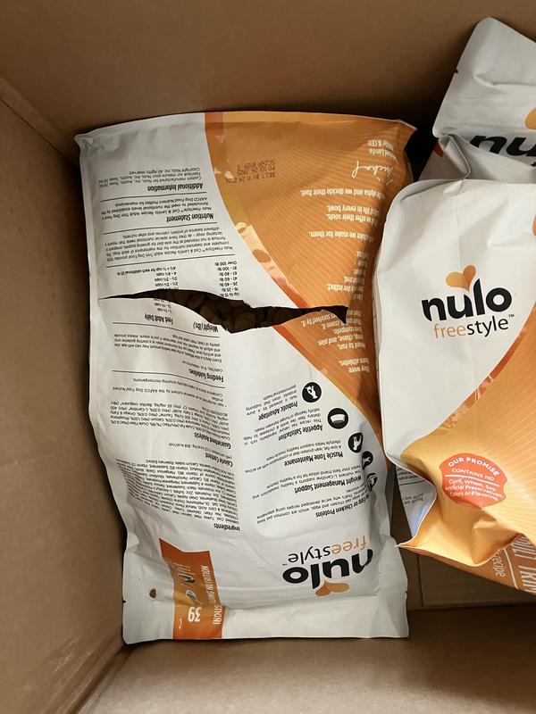 torn bag inside the box