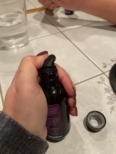 Stopper wouldn't budge. Had to use a razor to cut it off to use.