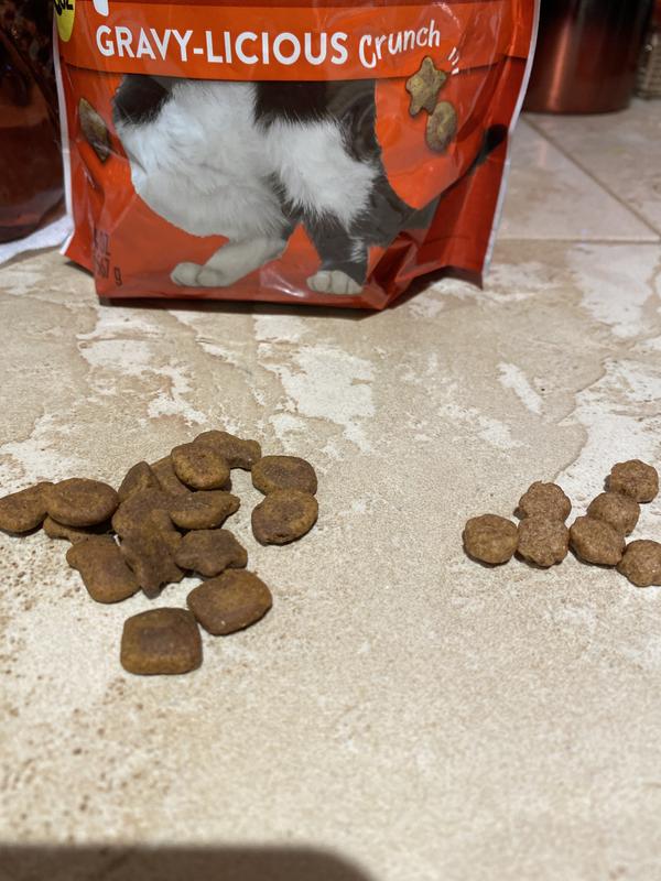 The pile on the left is the Friskies Gravy-licious. The pile on the right is the size they’re used to eating & the size difference to them is substantial.