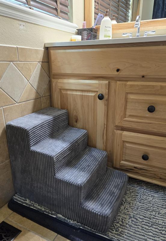 4 step stairs leading to 3ft high bathroom counter