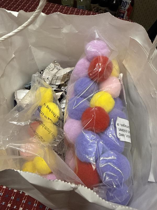 Storing colored balls for the one year old cat.