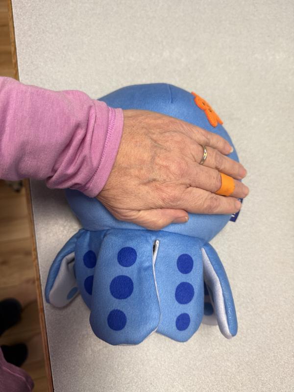 Larger than an adult hand, very round and stuffed firmly.