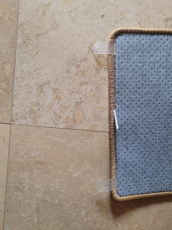 Tabs sewn into the back of the mat