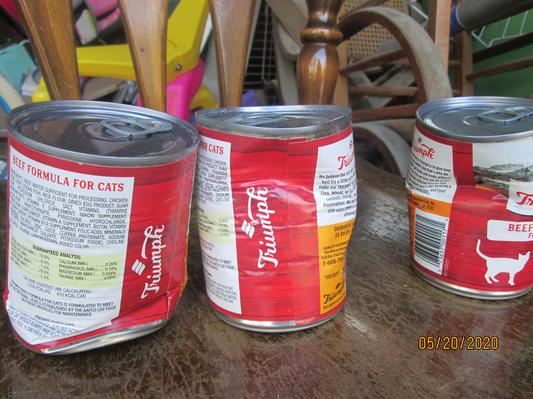 The three smashed cans.
