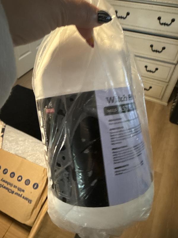 Empty gallon still in plastic.