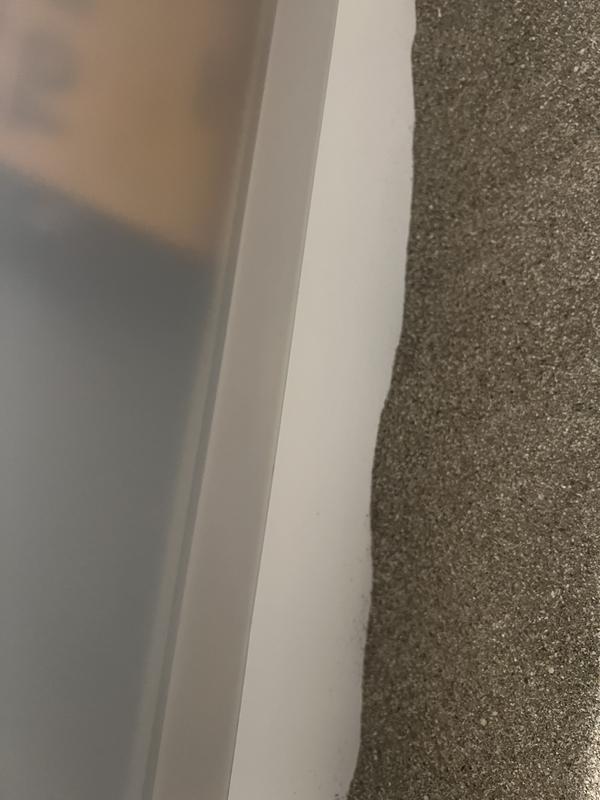 The top shell is removable, but sits inside the litter box to prevent urine from getting into the seams