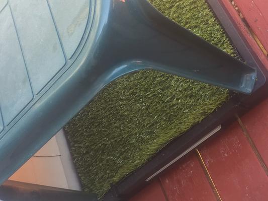 Pet Loo system- the cover is separate and is an old plastic outdoor end table