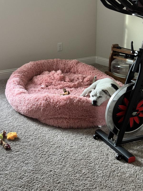 Soft, plush material and raised sides create a cozy space