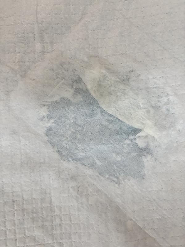 Hole that my puppy created after he found the hole in the pad.