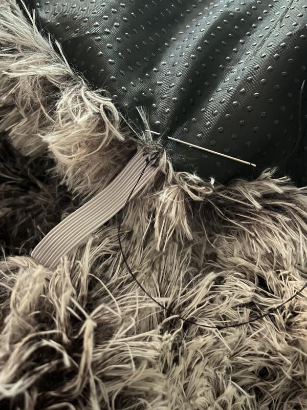 I stitched on the extra elastic loops and were able to attach them to the two toggles that were without a mate