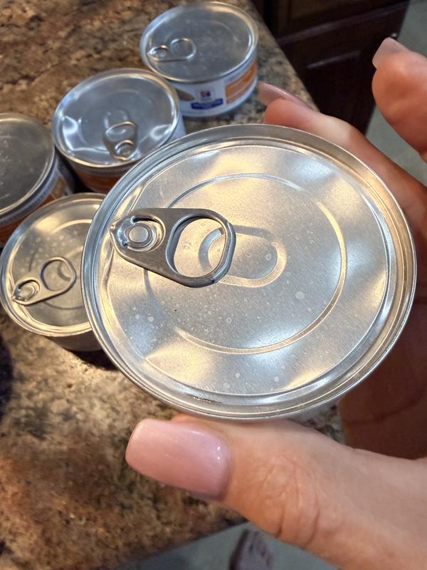 Damaged cans on three cases.  Stow completely different shipments.