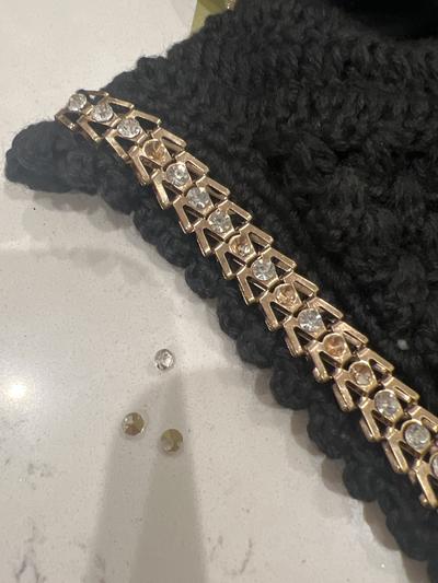 Gold spots are where stones are missing.