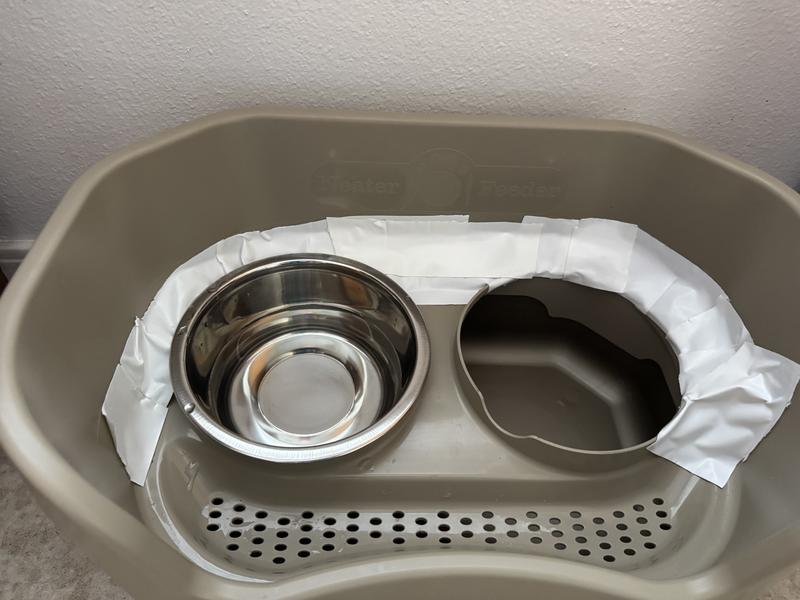 Tape covering the 3/4 wide & deep ditch behind bowls.